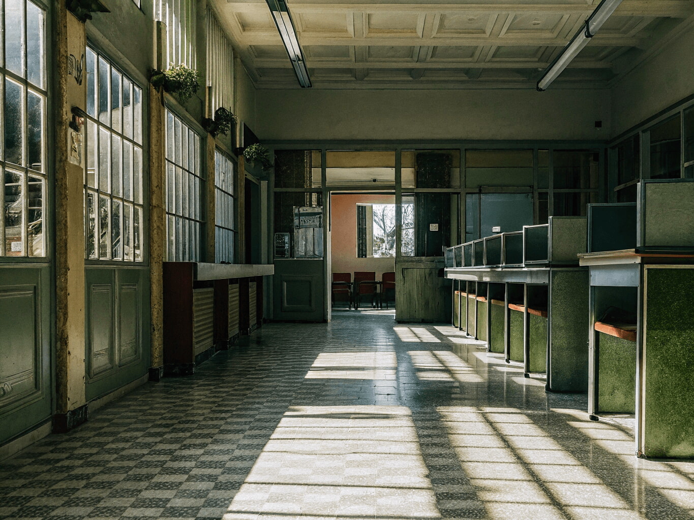 Bank interior with cash windows and tiled floor