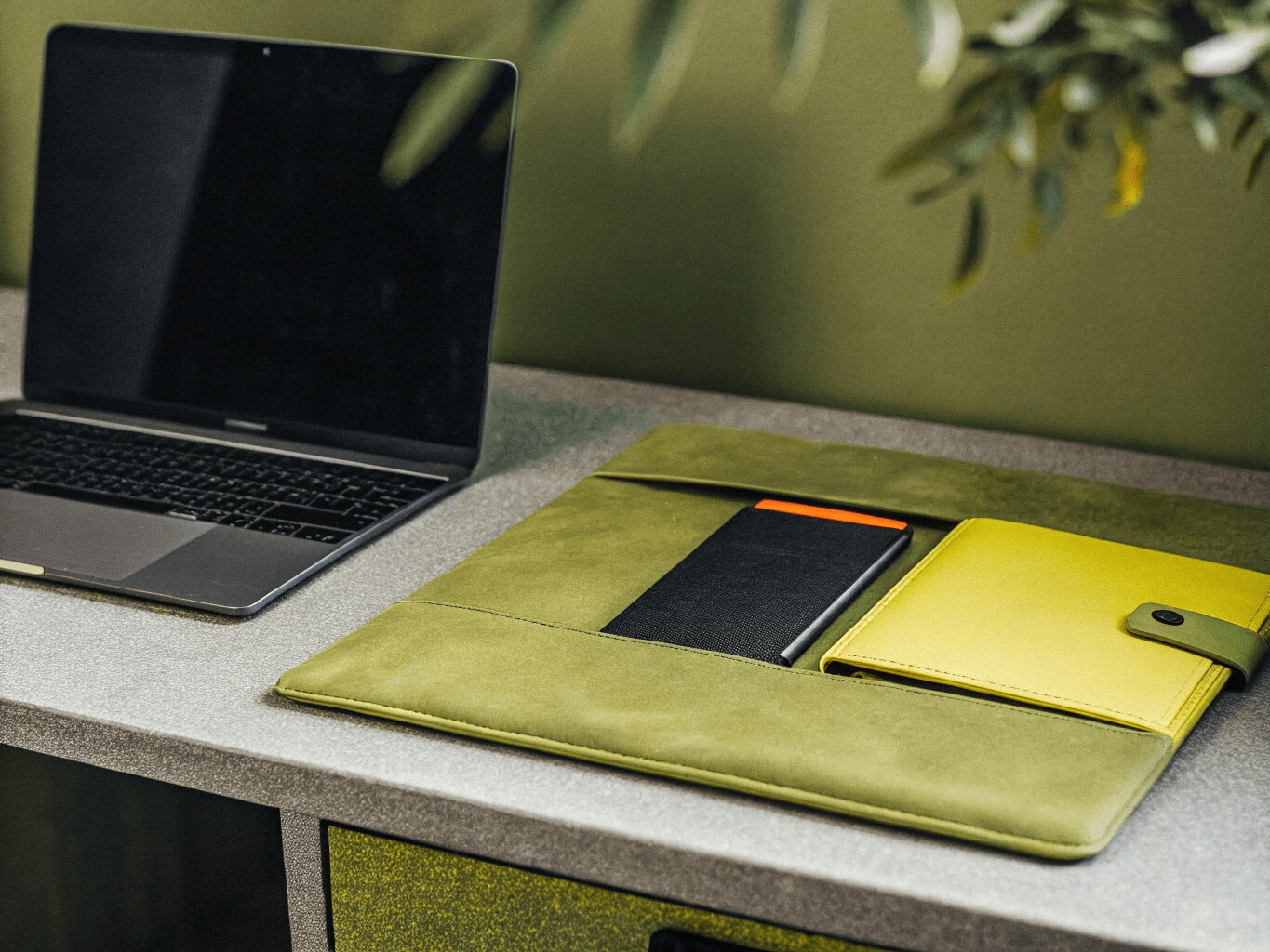 Desk with business laptop and corporate debit card
